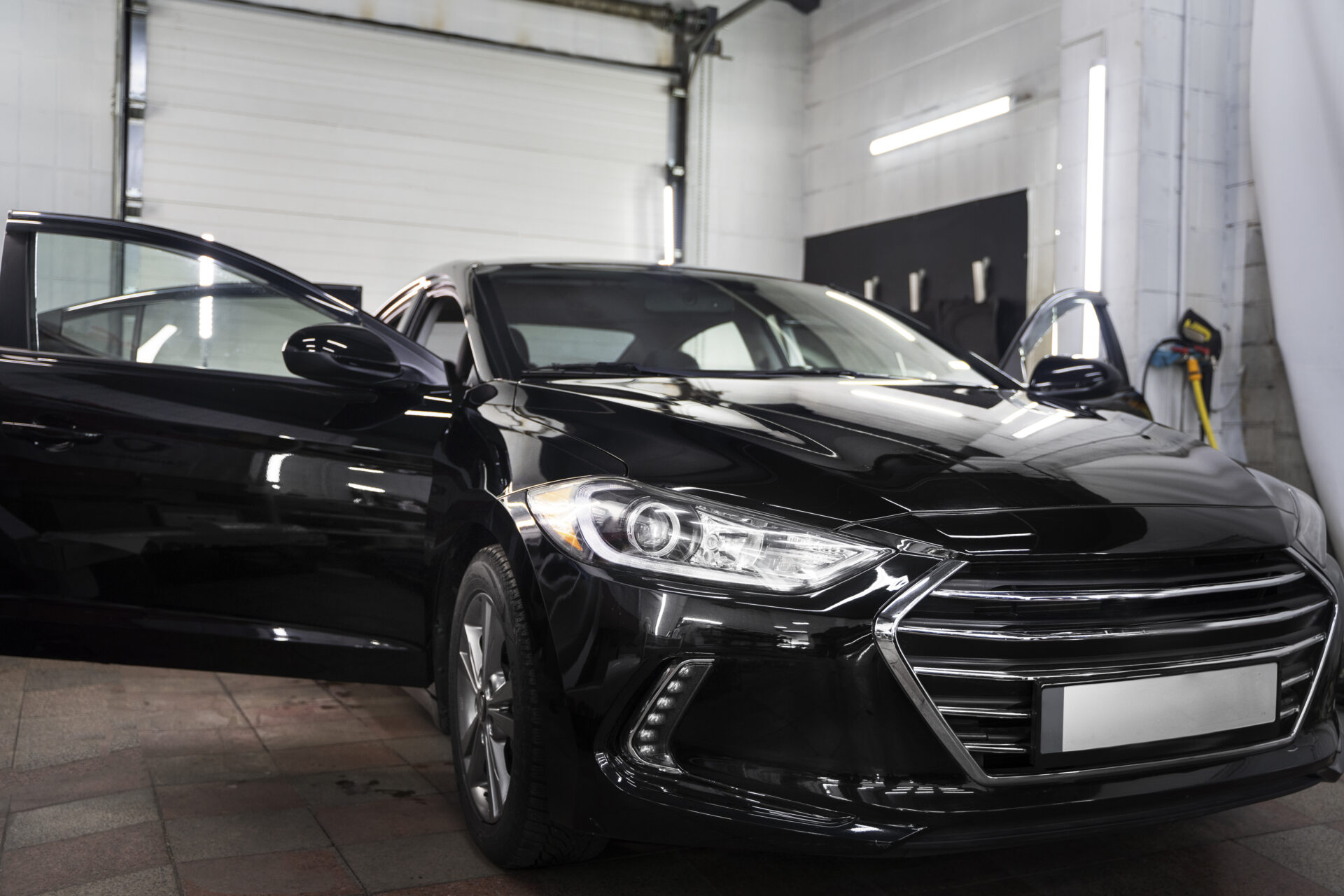 A professional will ensure that any existing swirl marks or imperfections are removed with paint correction before application.
